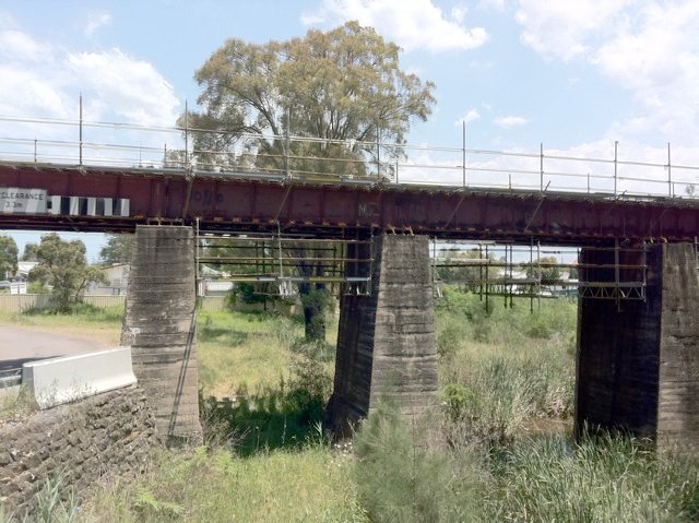 The rail bridge just before the station.