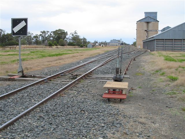 The view looking north from the station to the silo siding.  The former goods and loop sidings were located on the left side of the main line.