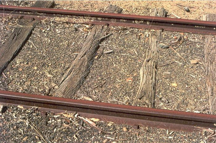 
Many of the sleepers in the siding are of the "rounded top" style.
