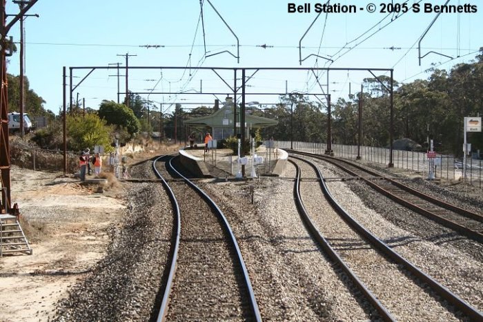 The view looking west towards the Sydney end of Bell platforms. The workers are surveyors and other RIC personnel preparing for upcoming trackwork.