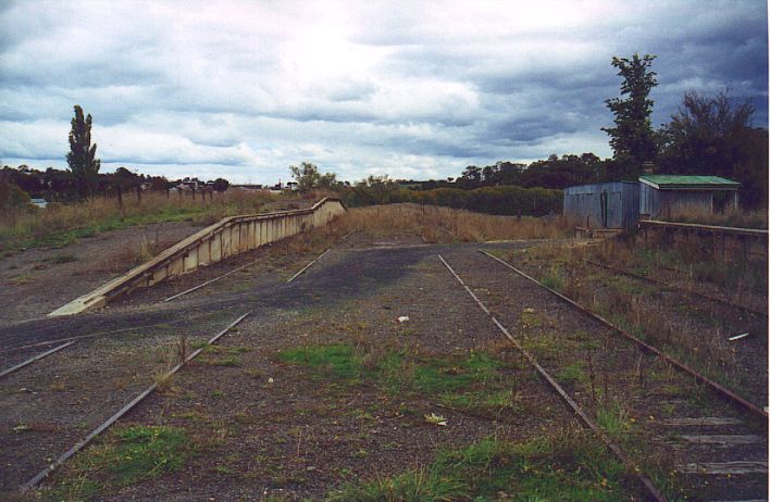 
The goods platform at the southern end of the yard.  To the right is a gangers
shed, and what appears to be a forge.
