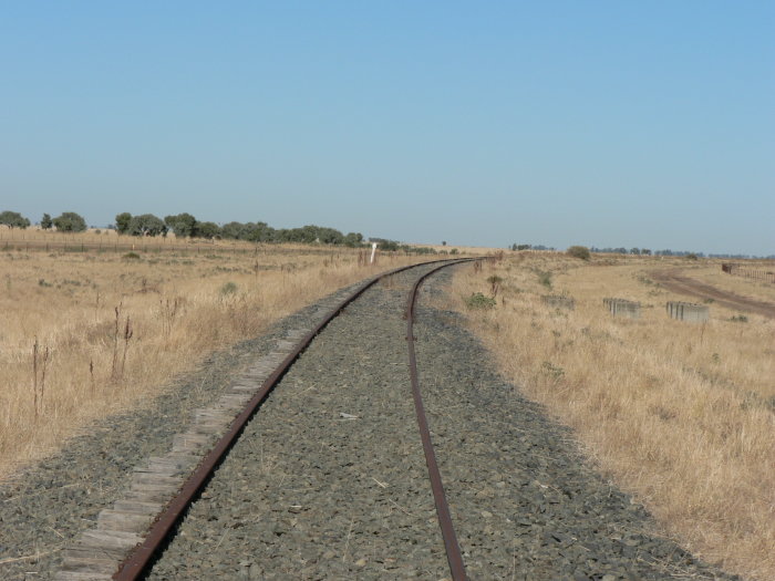 The view looking south through the location. The former station was on the left hand side of the line.