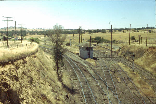 A view looking down to Albury where Demondrille North Box can be seen and also the two separated platforms, the one from the branch on the right.