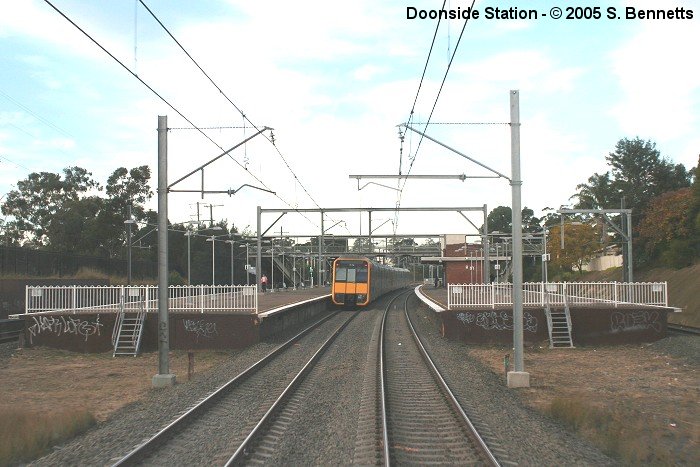 The view from the rear of a Blue Mountains train looking east towards the station.