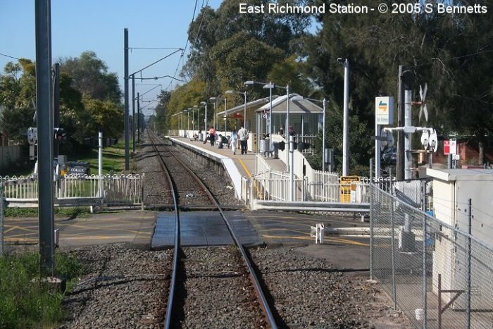 Photo shows East Richmond level crossing and station looking towards Sydney.