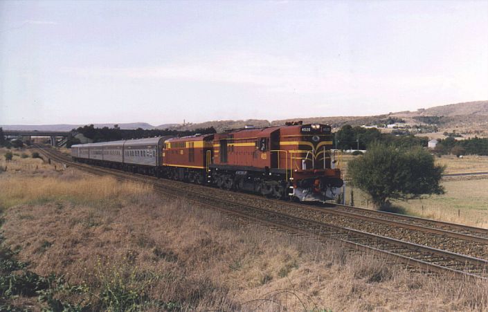 
Heritage locos 4520 and 4490 lead a charter train south up the hill from
Goulburn station.
