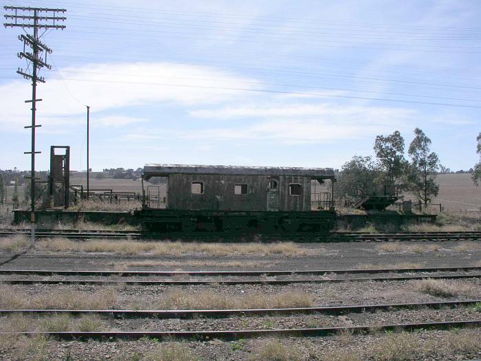 
An old wagon sits in the siding adjacent to the stock platform.
