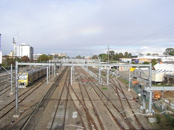 Northern Line, looking south from Bridge Road overpass, Hornsby. The lines from far left to right are Nos 3 and 2 Up sidings, Outwards and Inwards Car Shed roads, No 1 Up siding (with train), Up Loop, Up and Down Main,  No 1 Turnback road, DOwn Refusge, and Nos 1 and 2 Down Sidings.
