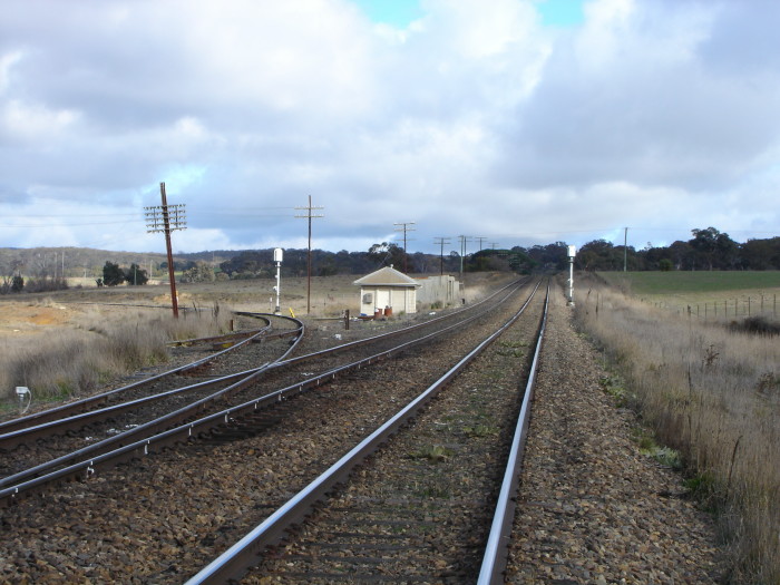 The branch to Canberra curves off the the left.  The signal box is no more.