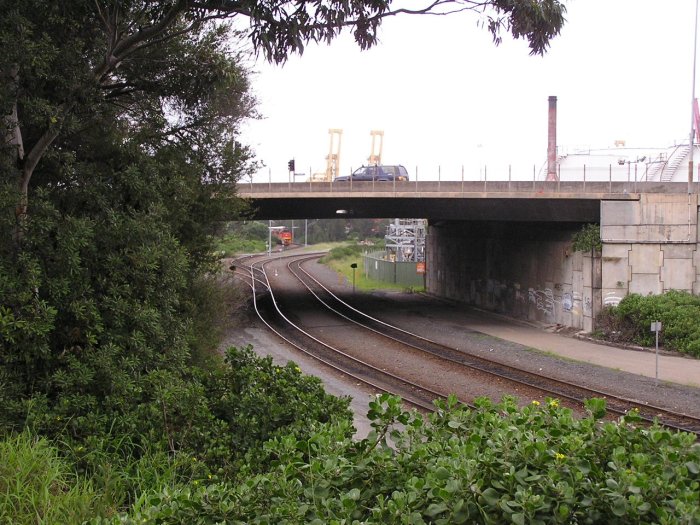 The view looking south at Botany Road overpass. In the distance, the lines diverge to the CTAL and Patricks container yards.