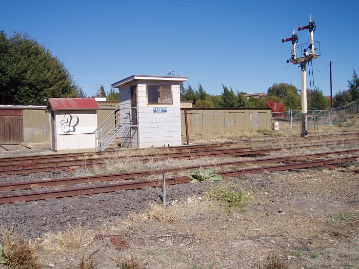 A side-on view of the F Frame signal box, with the gangers shed behind.