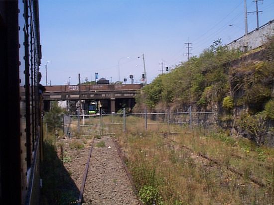 
The start of the former line to Darling Harbour, now the
current end of the Sydney Light Rail line at Lilyfield.  Rozelle Yard near
the Balmain Rd Signal Box.
