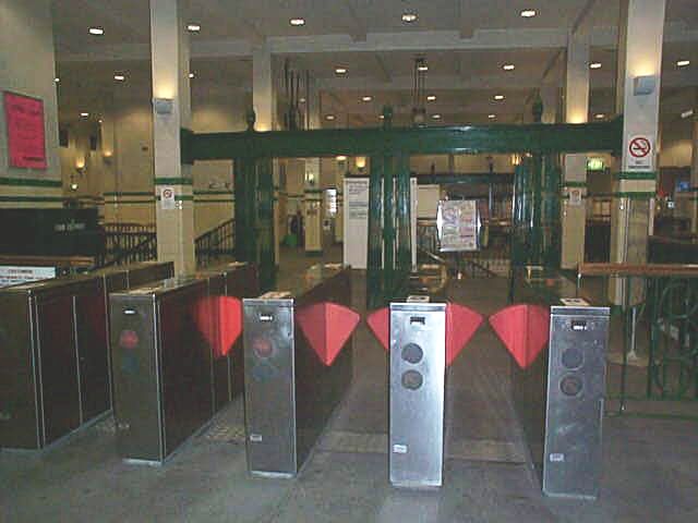 
A view of the station entry barriers showing some of the original fixtures.
