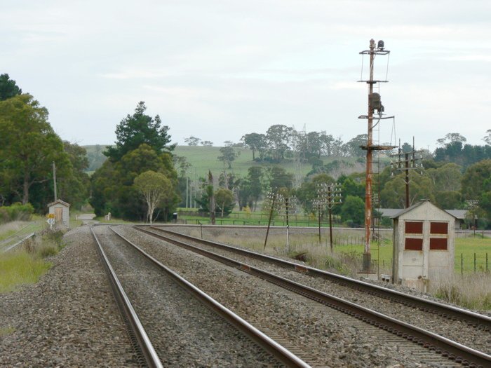 The view looking south towards the former station location. Werai was a pair of outside platforms located just before the start of the curve. The post on the right was a former Distant Up signal.