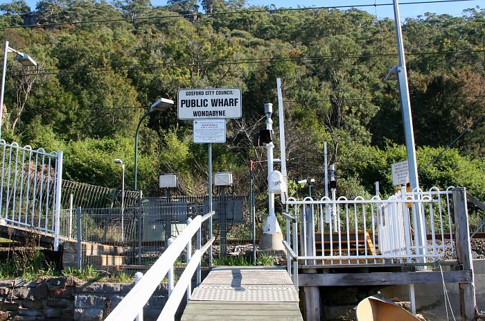 Station entrance and pedestrian crossing viewed from jetty.