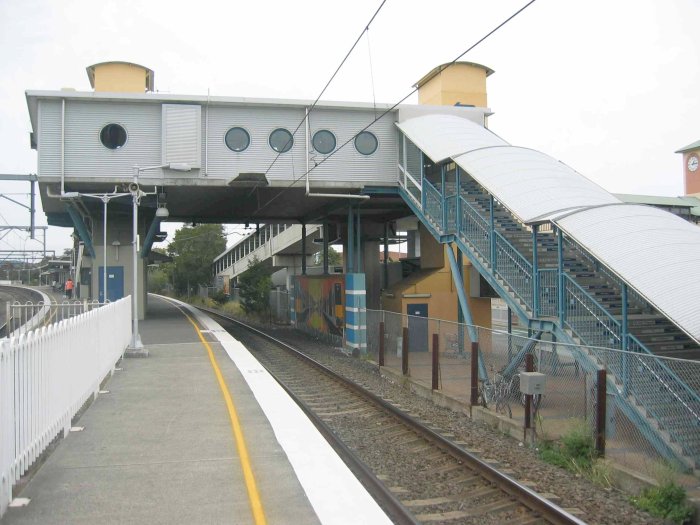 A closer view of the modern pedestrian overbridge, looking north.