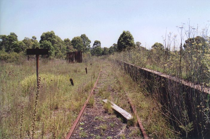 
The view of the down main and platform facing.  The sign on the left once
read "WHISTLE".
