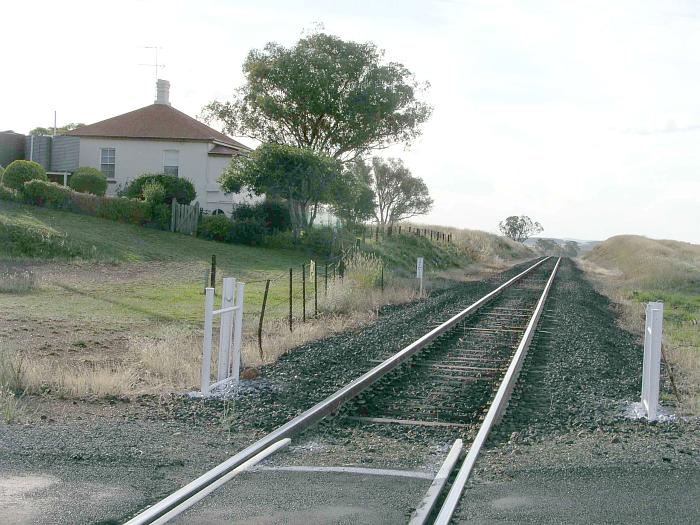 
The view looking west down the line shows only the residence of the
gatekeeper for the one-time gated level-crossing.
