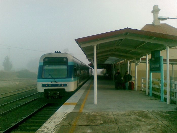 Explorer train NP24 sits at the station on a cold and foggy day.