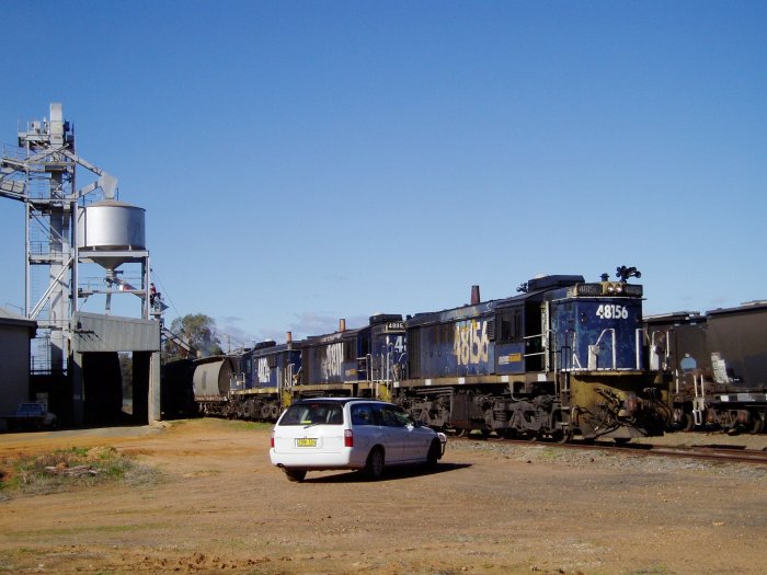 48156 is at the head of a train loading grain from the silo.