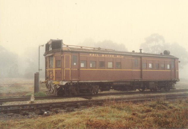 Diesel Rail Motor 16 is stopped in the yard.