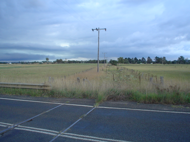 The view looking up the line at the former level crossing on the Old Hume Highway.