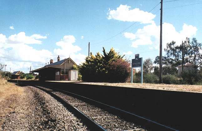 
A ground-level view of the island platform and building looking towards Yass.
