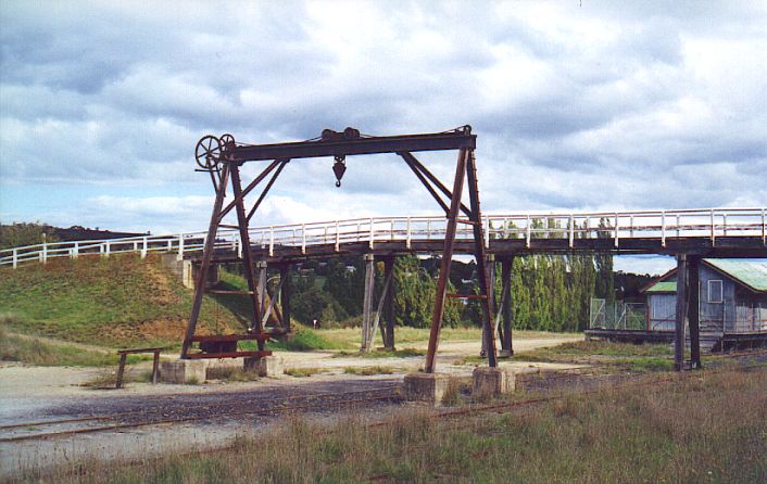 
The goods crane is still present.  Behind is the footbridge which served the
station;  it is still used to cross the yard.
