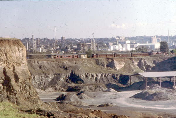 A panoramic shot of the Brickworks, now a part of the Olympic complex, back in 1982. Brickworks Signal Box can be seen in the centre and this was frequent home for storing "red rattlers". Also a trio of Rail Motors can be seen approaching on their way to pick up the afternoon shift at Abattoirs.