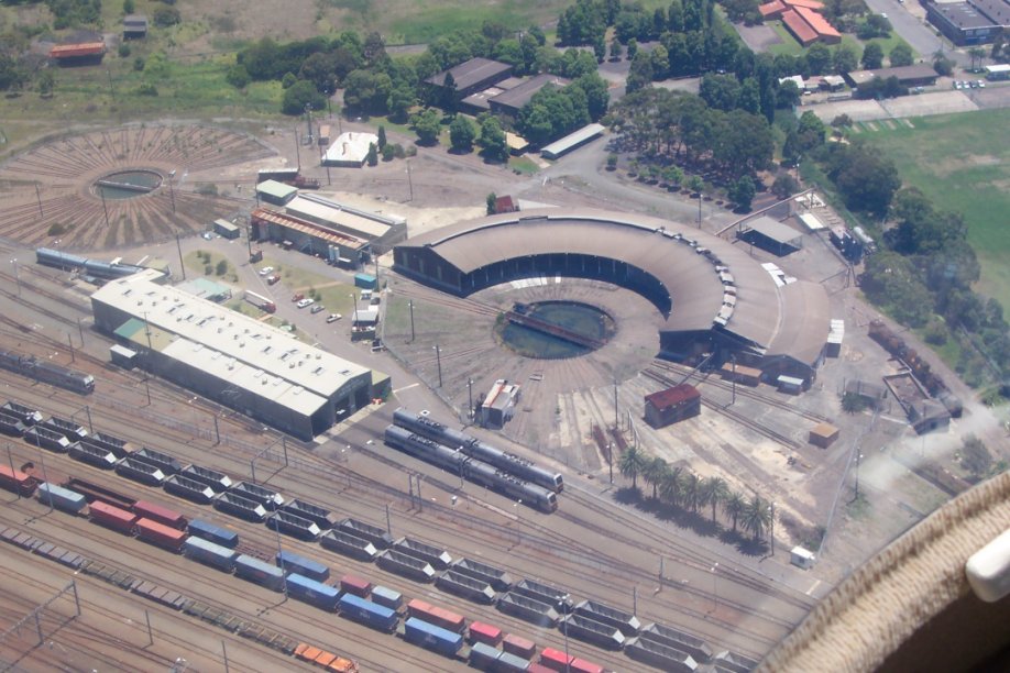An aerial view showing the Broadmeadow roundhouse and turntables, the Endeavour Sheds and part of the yard. This is the area south of Broadmeadow station.