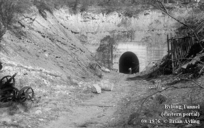 The eastern portal of Bylong Tunnel in 1976. This end of the tunnel was dry, and access to the abandoned workface several hundred metres inside was possible.