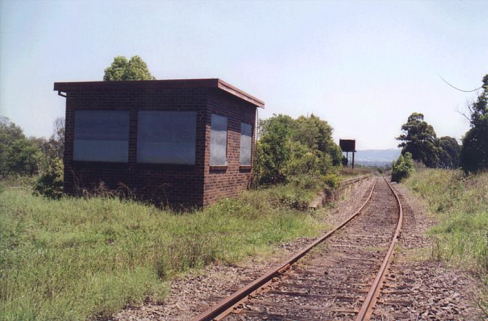 
The signal box at the up end is boarded up, and completely stripped inside.
