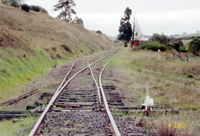 The view looking north towards the station.  On the left is the crossing loop. No longer present in the right middle distance is the former dock siding.