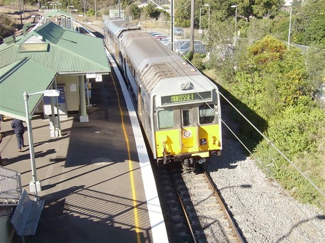 Two-car double deck set K4 stopped at the up platform of Cardiff Station.