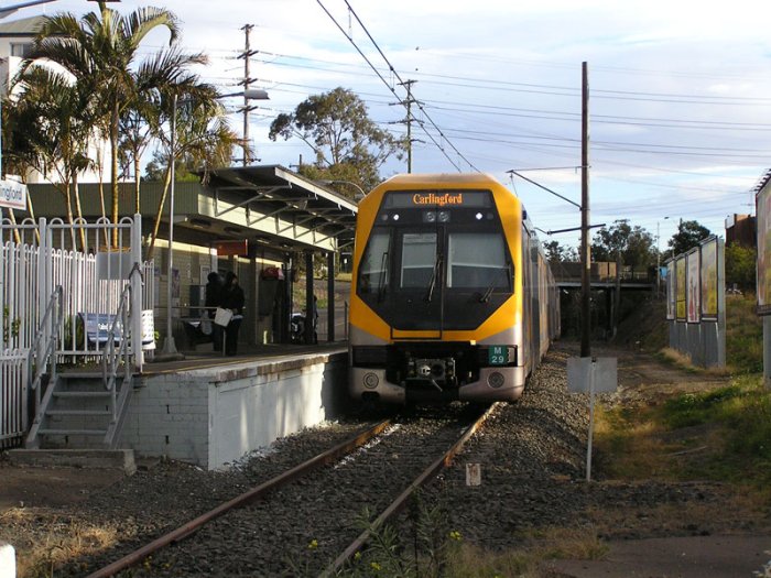 M29 on a down Carlingford shuttle service enters the station.