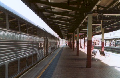 The view looking along Platform 9  with the 1.47pm Central to Gosford 4-car double-decker interurban standing alongside.