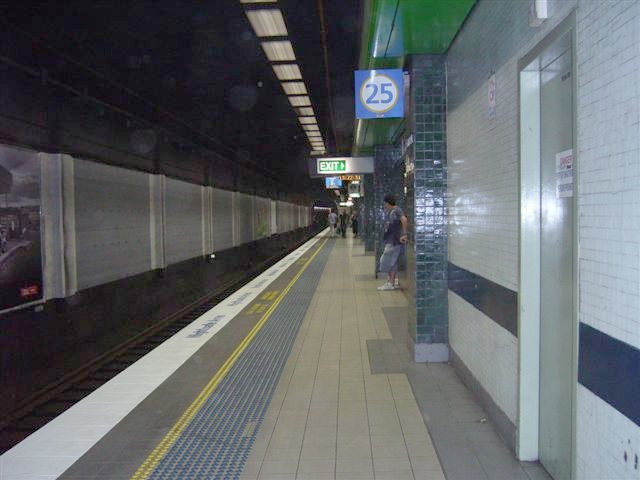 The view looking along underground platform 25 towards Redfern.