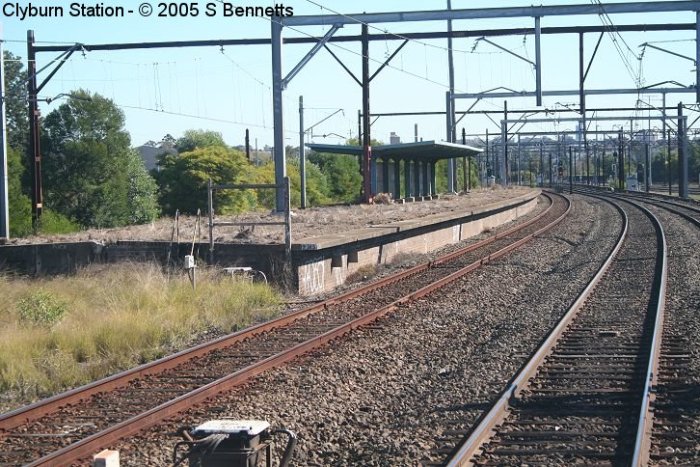 The view looking west along the platform.  The one-time footbridge at the near end has been removed.