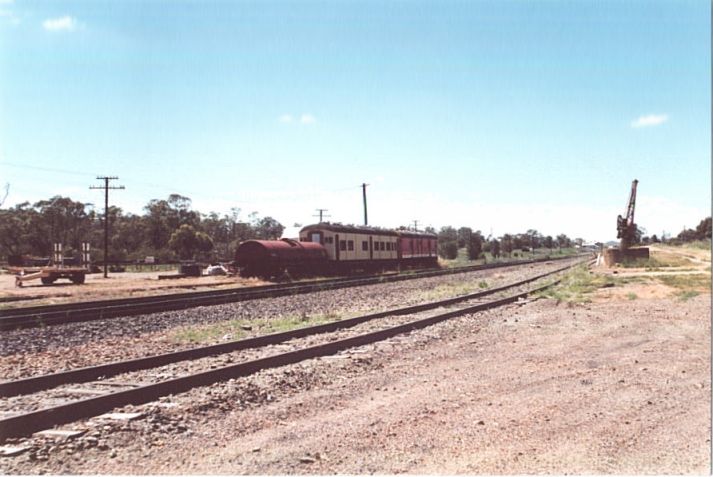 
A water gin and a couple of carriages sit in a siding opposite the jib
crane.
