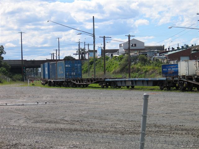 
After passing under the Princes Highway, a freight train heads towards the
yard.
