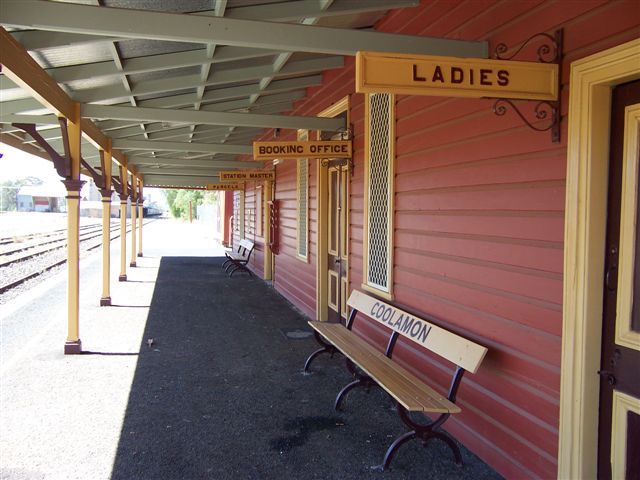 
The view looking east along the platform showing the various office signs.
