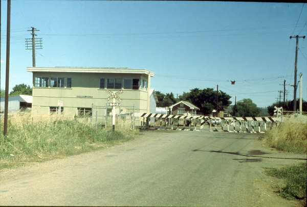 The utilitarian Cootamundra North Box with the level crossing gates.