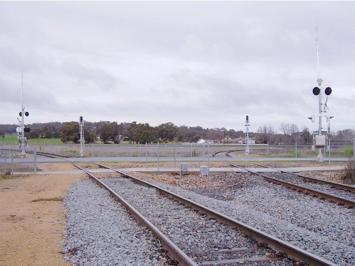 The northern and southern arms of the Cootamundra triangle showing the two level crossings over the Olympic Highway at Cootamundra West - a view looking south-east.