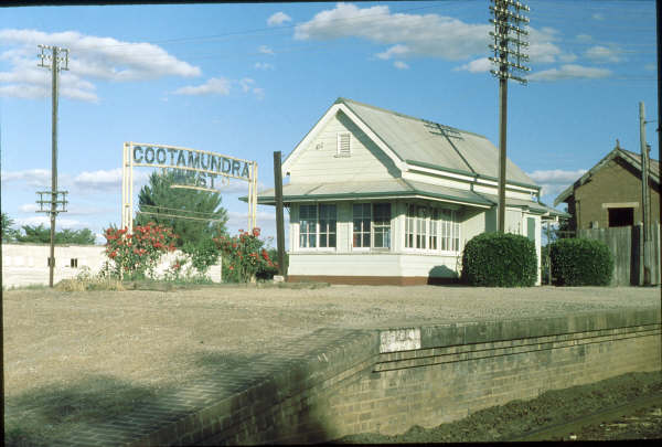 The iron station sign and signal box still used 1980.