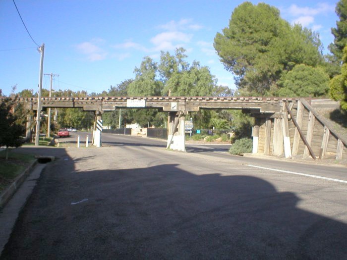 Eugowra branch crosses over Lachlan St, immediately before the level crossing of the Mid Western Hwy (just out of shot to the right.