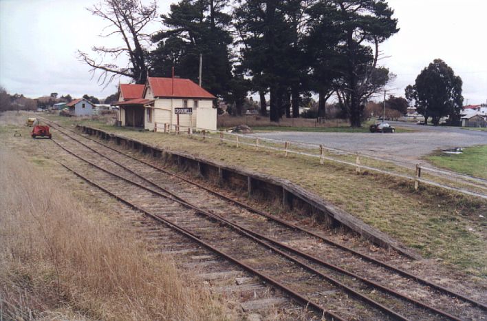 
The view of Crookwell station and yard, shows that it is still in
excellent condition.  The loop siding includes a rail trike (red)
and weed sprayer (yellow).
