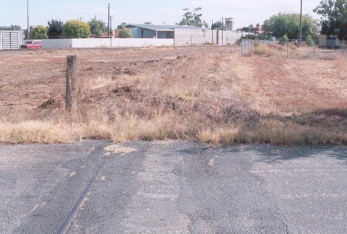 Just south of the now removed junction with the main south the Holbrook branch crosses South Street.  The crossing is now nearly all tarred over.