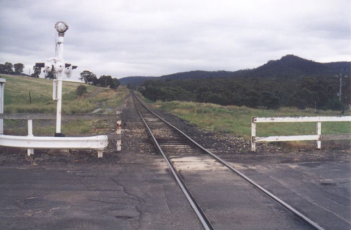 
The grass mound on the right side of the line is the location of
Cullen Bullen station, in this view looking north.  No trace remains today.
