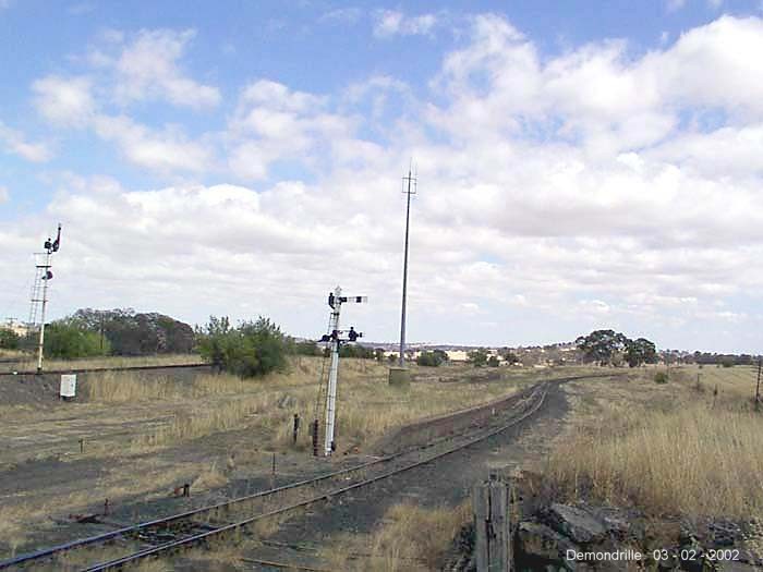 
The overgrown branch line platform is still present, along with a pair
of semaphore signals.
