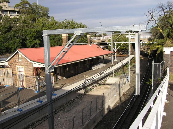 The old station building, looking south from the old footbridge across Beecroft Rd. Epping Rd overpass is in the background.